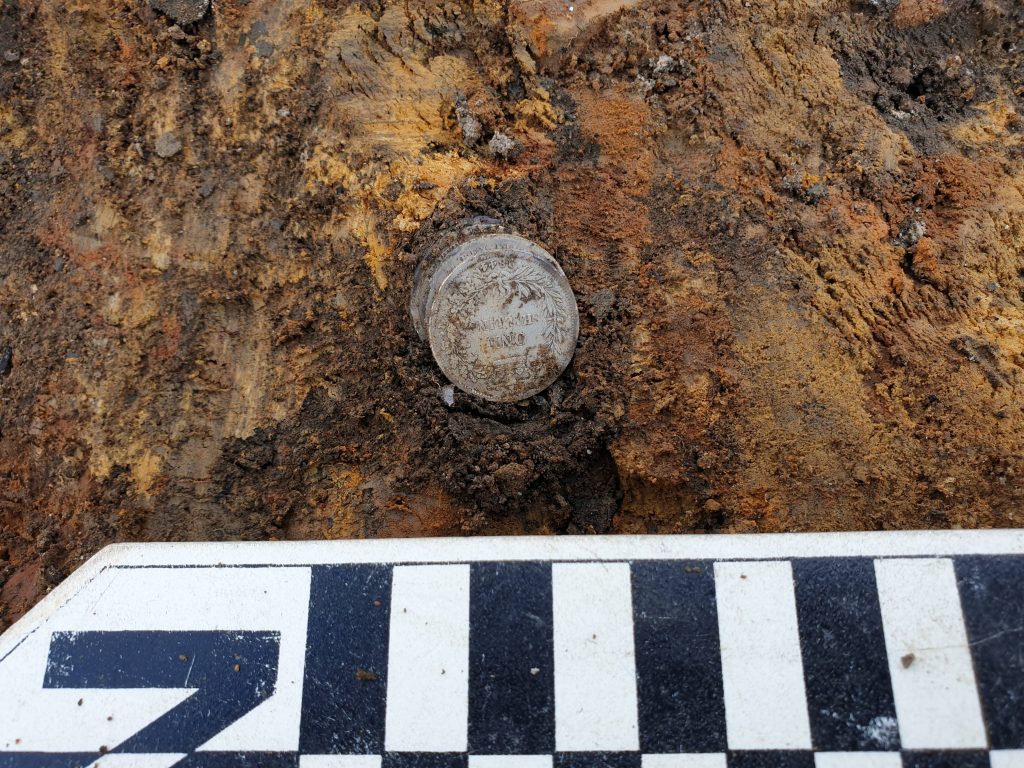 Cache of shilling coins found in a corner of the Workshops